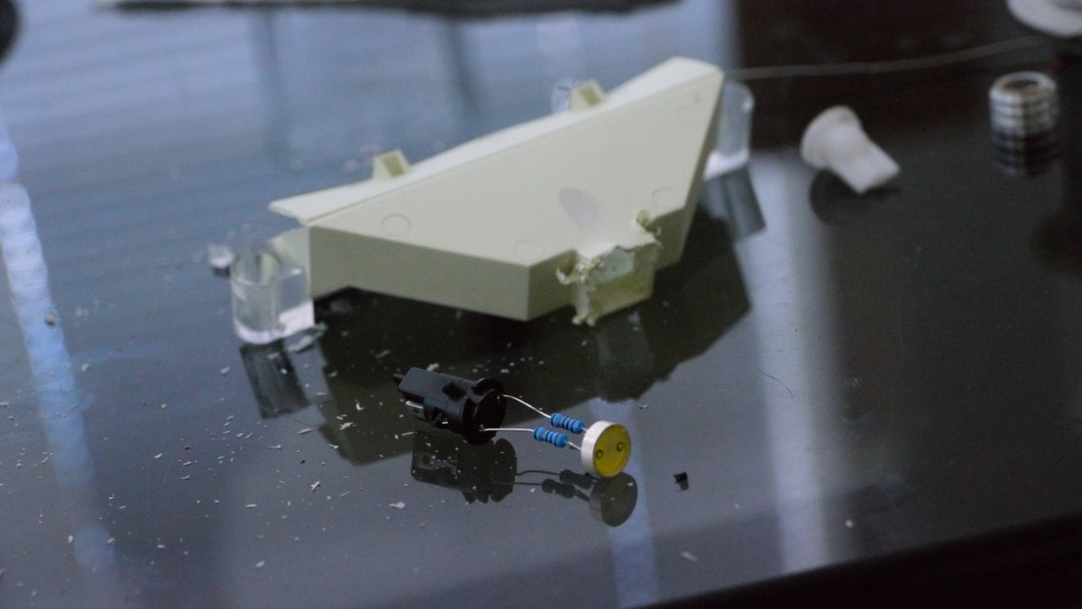 LED soldered onto bulb holder.