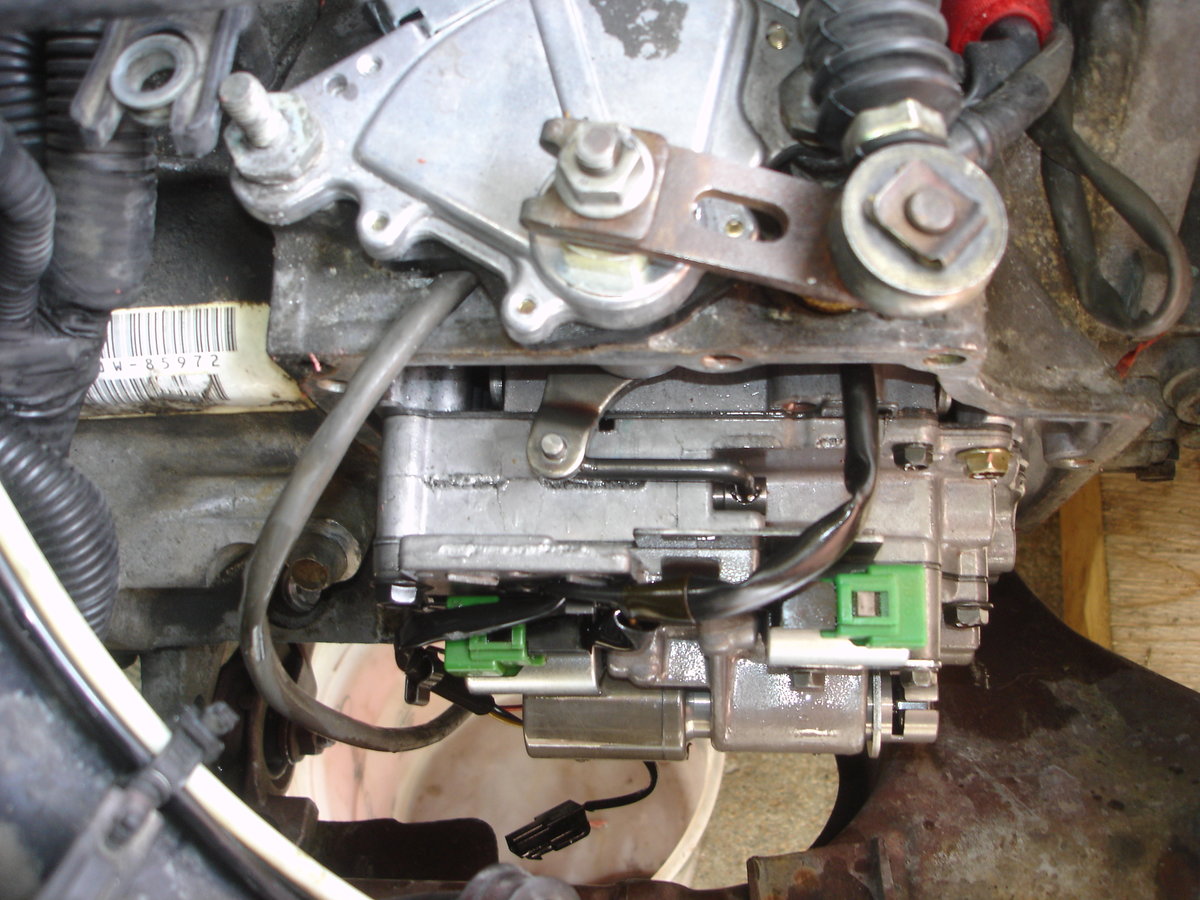 The solenoids have the green clips on them.  They are only about an 1 1/2 inches long.