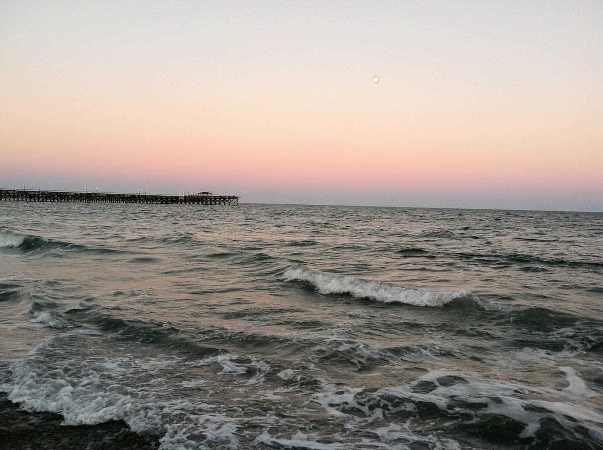 If you look closely, you can see the moon above the boardwalk in this picture.  It was pretty cool.
