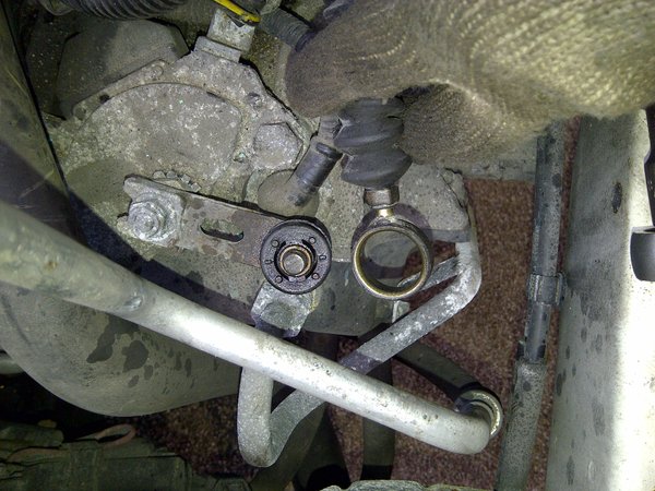 Shift cable removed from grommet.