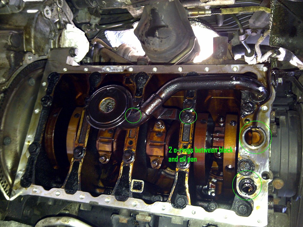 10 mm bolts.  You can see where the two o rings go.  One dropped with the pan the other stayed in the block.  You can see the o ring pinched.