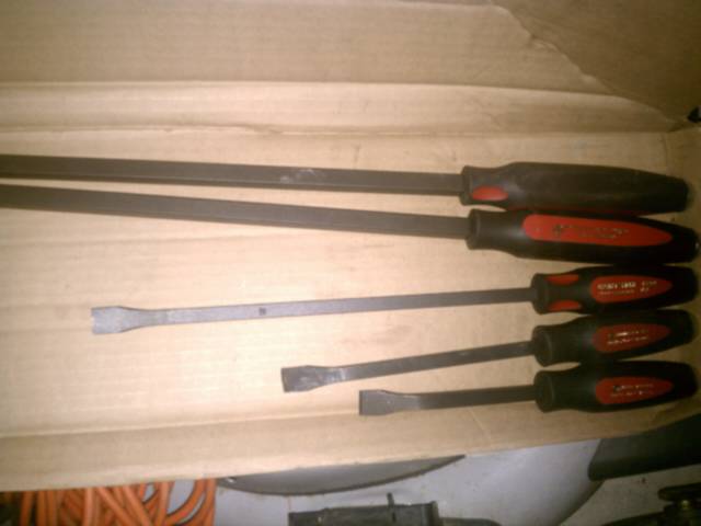 Mayhew rebranded prybars, 8"-31" w/ striking caps. No place to put them so they sit on my lawnmower for now...