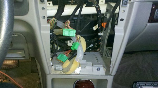 here you can see the hose that sucks the cabin air over the temp sensor. My sensor had a insulating layer of dust on it. It is very easily cleaned if you disassemble the entire ECC unit but if you don't an air hose should work just fine.