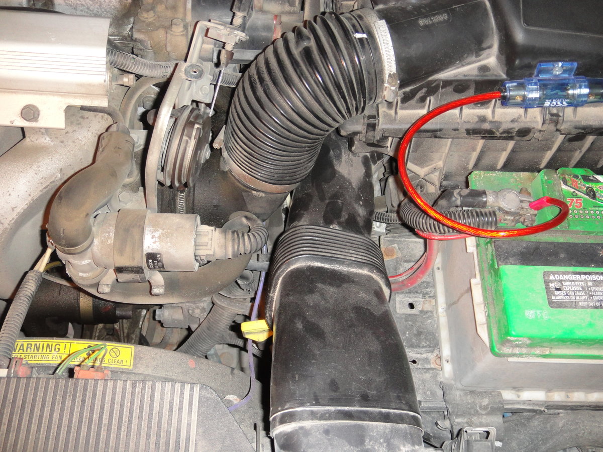 First take off the negative battery terminal, as you will be unpluging sensors from various areas. Second, take off the Air-Box hose, and Air box - elbow hose.  A bit of bending is needed as well as some force.