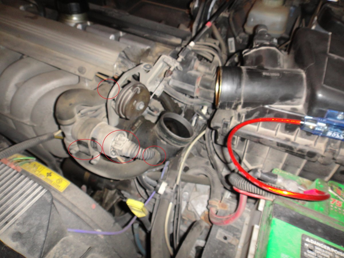 Next take off the Mass Airflow Sensor.  The Sensor tail comes off the end. Let it dangle. The two hoses come off rather easy.  The unit itself comes off by a clip at the bottom, push in and pull up.