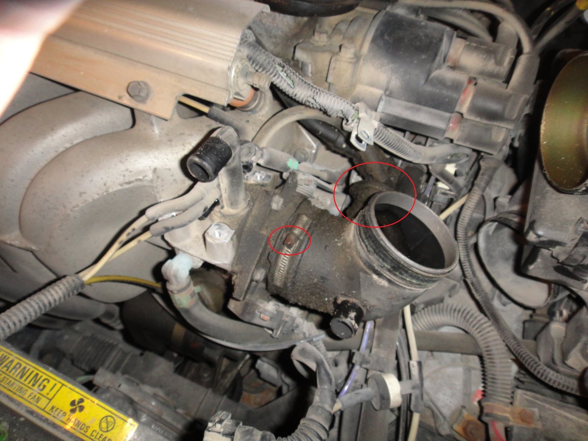 now that the elbow is more exposed, twist out the flame trap, and undo the hose clamp. Mine was loose to begin with.