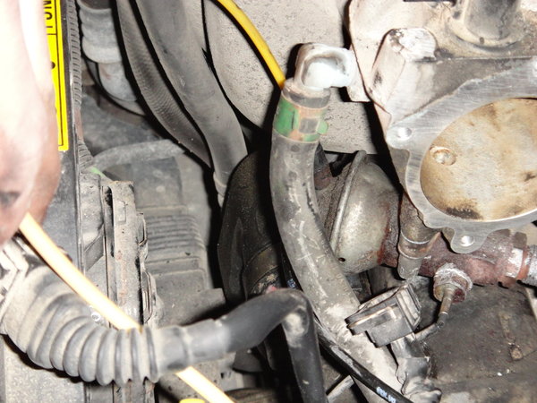 I found it easiest to put a dab of super glue to hold the gasket on, while i put it on, hook it by its tail, then put the two bolts in. (as far as torque goes) ((Very SNUG)) as you won't be able to get a wrench down there ((Ozark Lee))<br />They go on as good as they come off. Have some Patience...