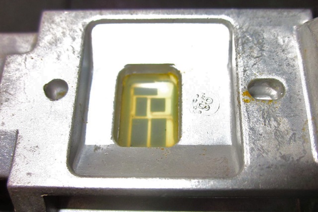 Sensor or circuit on backside of Bosch MAF unit, under a yellow plastic film