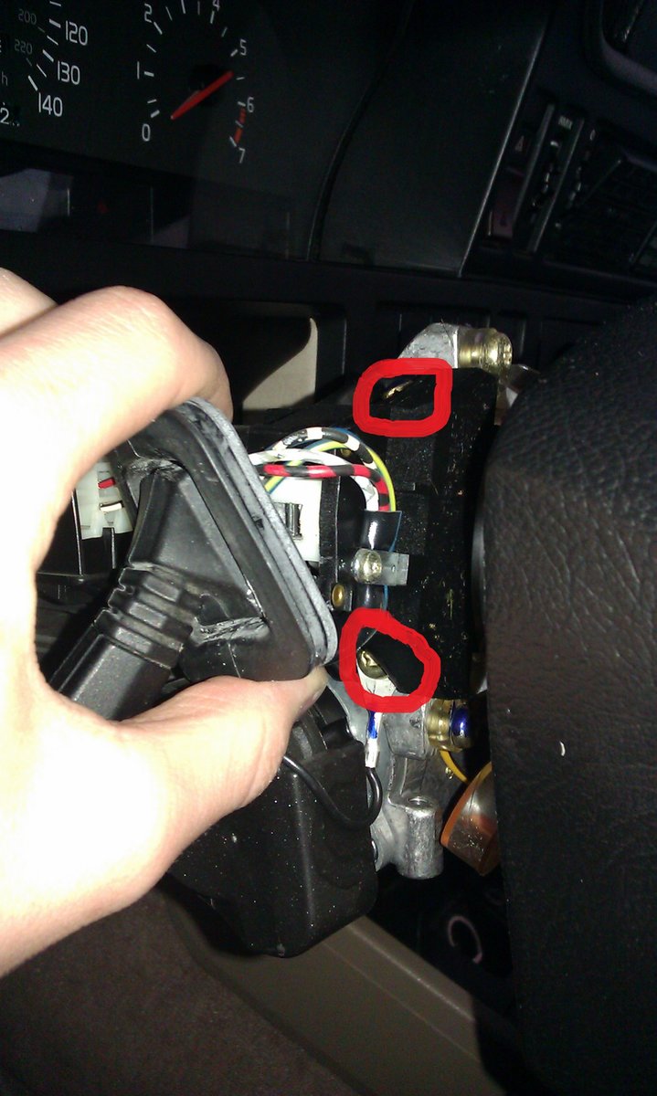 Next, remove these two bolts, the bottom one has a ground wire on it, make sure you don't for get it when you are re-assembling.