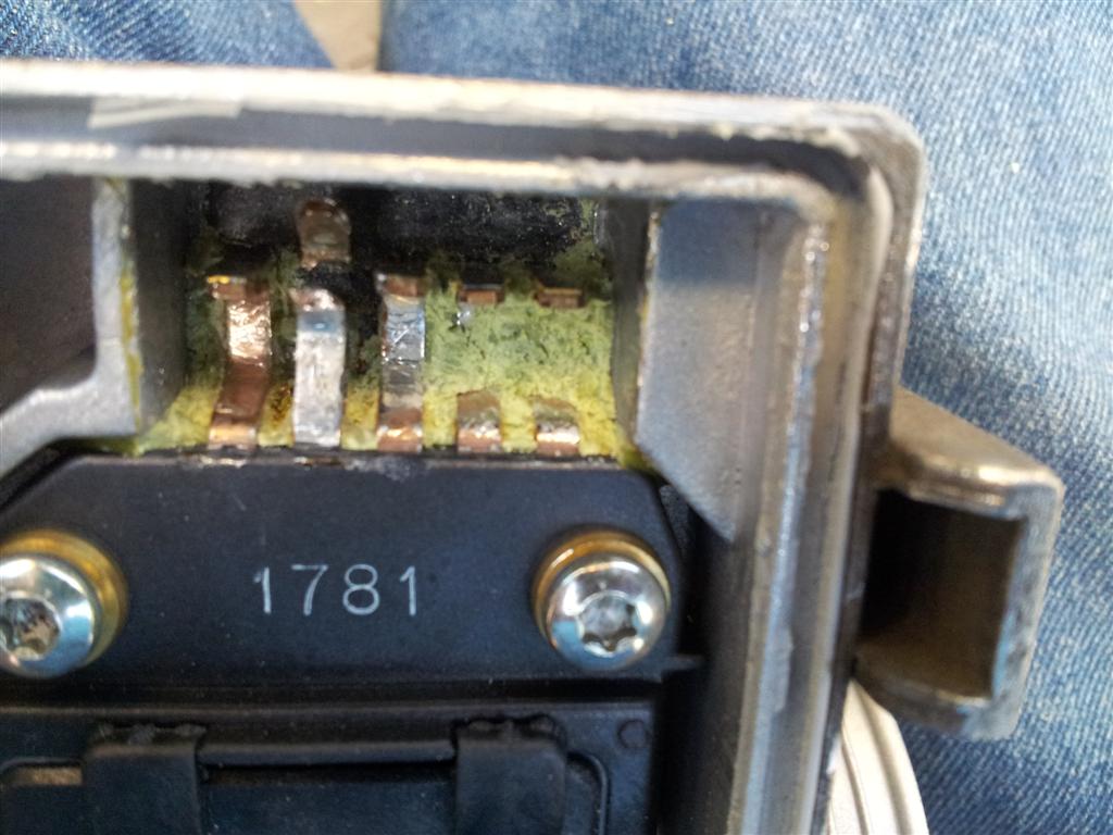 You need to separate and isolate this pin (I drilled it apart with a 2.5mm drill as my 40W iron was having no effect)