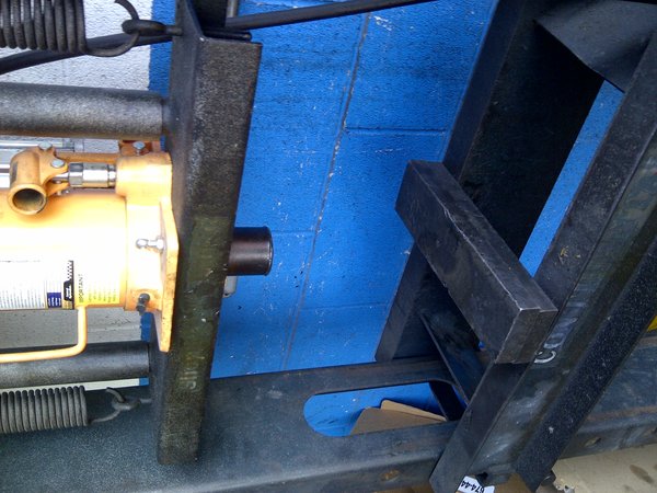 i used this hydraulic press, pay close attention, to the control arm round housing, it has a tapered side and a flat side, you want to press it from the tapered side in, which would be positioned up ones its done. The bushing bolt/rubber hole has a short head and a long head, the long head is the UP side once pressed in, in case you forgot how you took it out, in my case ;)