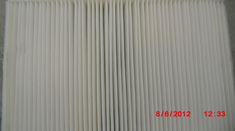New and clean Purolator brand cabin air filter without a solid frame.