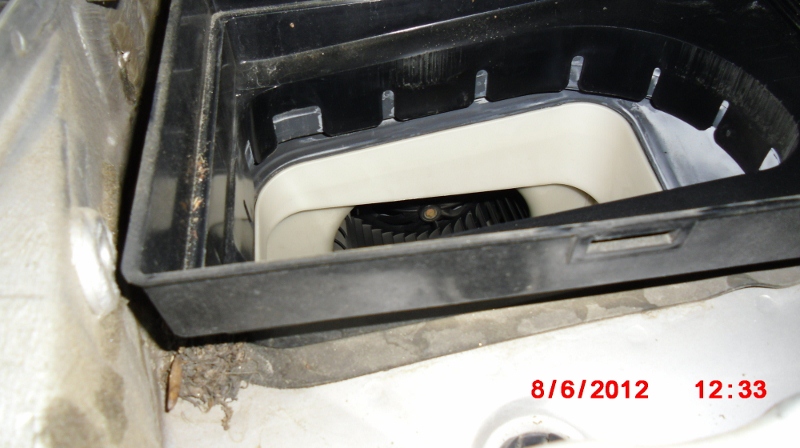 Vacuum in and around filter retainer area. No filter means most of the debris will end up in the blower motor underneath.