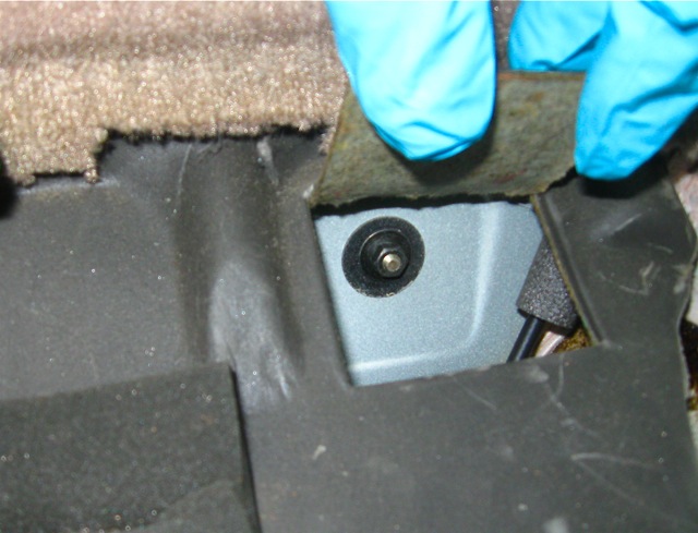 5) Lift flap to expose 10mm bolt.jpg