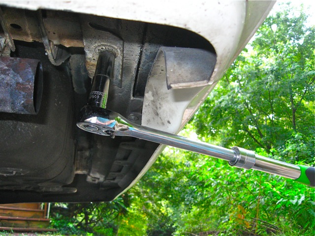 17)  Loosening bumper bracket bolt.jpg