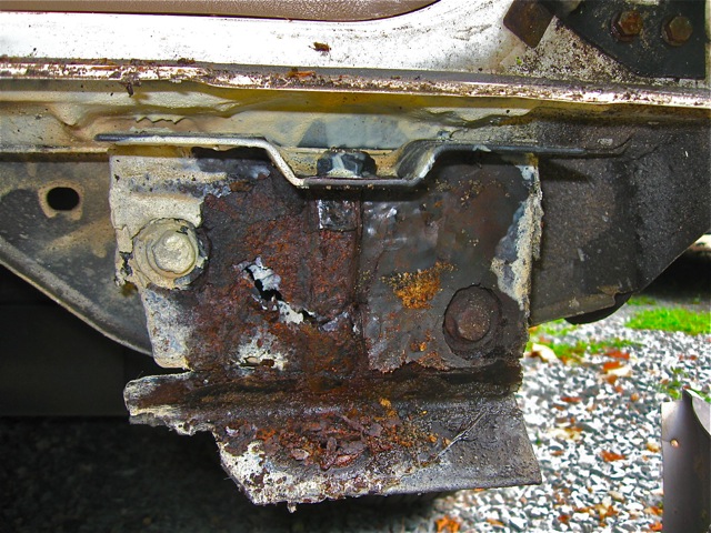 20) Nearly complete corrosion on bumper bracket.jpg