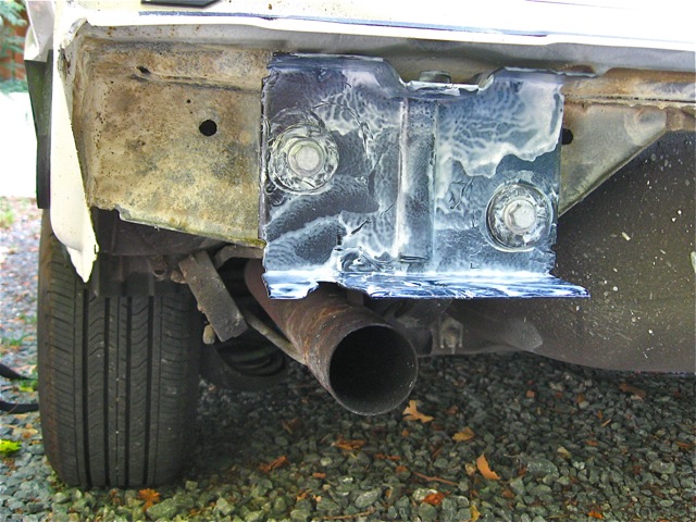 24) Attach new bumper bracket with bolts and washers.jpg