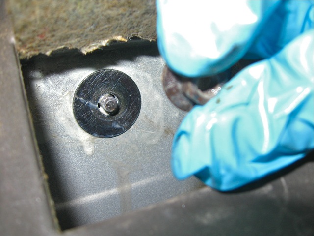 30) Install washer and 10mm bolt on driver's side (from inside car).jpg