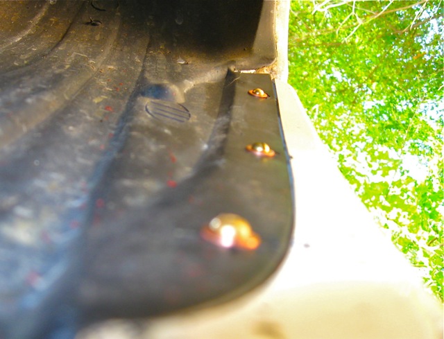 33)  Screws installed to hold bumper wing to wheel well liner.jpg