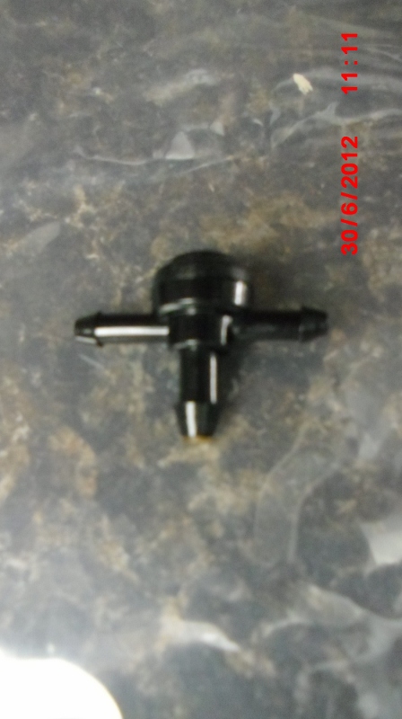 New 3-way valve for headlight washer.