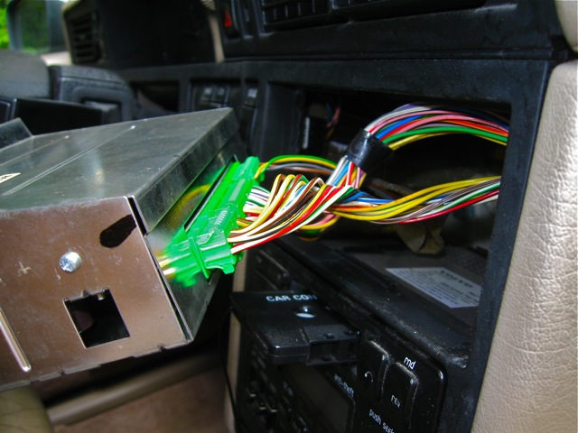 Remove the three green connectors on the back of the ECC module.