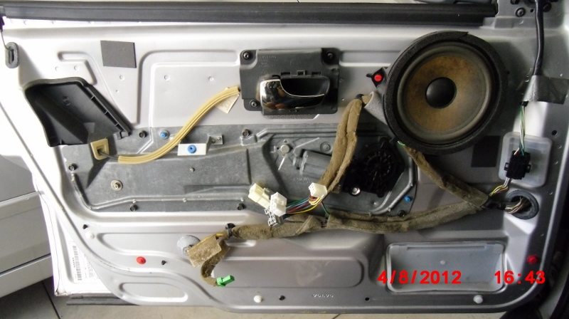 1998 V70 XC driver's door without interior trim. Look at the lousy OEM foam cable coverings!