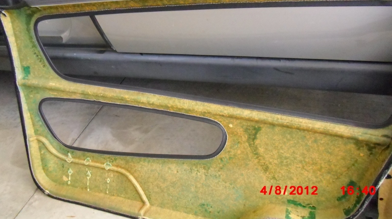 Second half of a 1998 V70 XC driver's door interior trim. Factory glue failed.