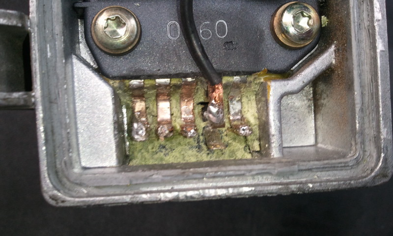 5 prong side with new wire soldered.  Voltage from left to right: 12V, 0V, 9V, 2.5 V, 12V