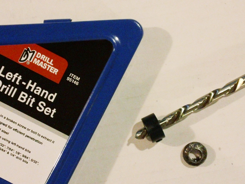 1/4" left-handed drill bit with stopper, and removed T40 screw head