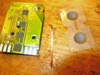 Plastic contact circuit with a thin strip of 1 mil (~25 micron) copper sheet