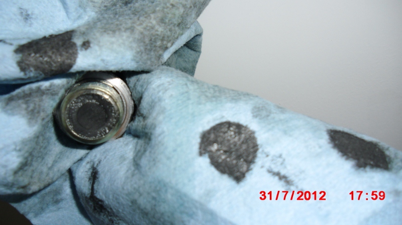 Nasty crud stuck to ATF drain plug, looks like a magnet in the center.