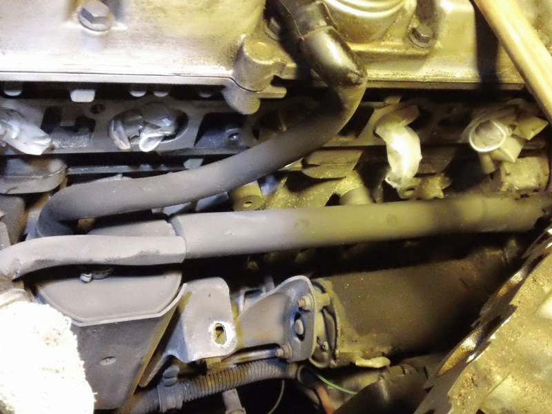 once bracket was removed, oil trap box bolts are easy access