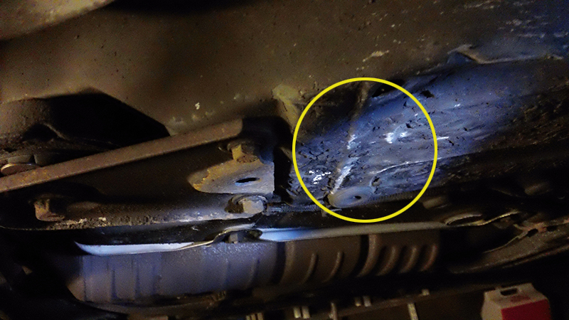 frame surface behind the rear bushing mount plate