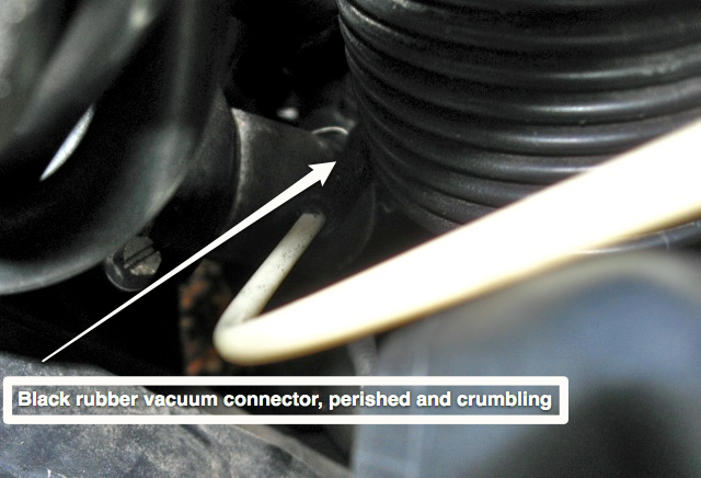 Rubber connector at end of white plastic hard line on the Fuel Pressure Regulator vacuum line