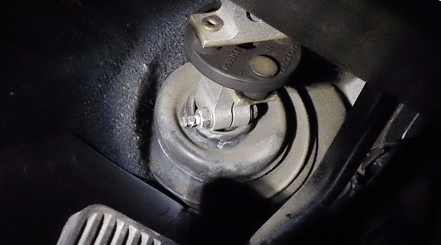 a cabin view of u-joint at the lower steering column