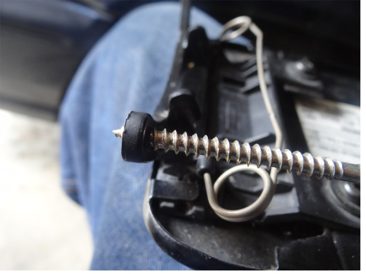 Strip out wider holes on old brace.JPG