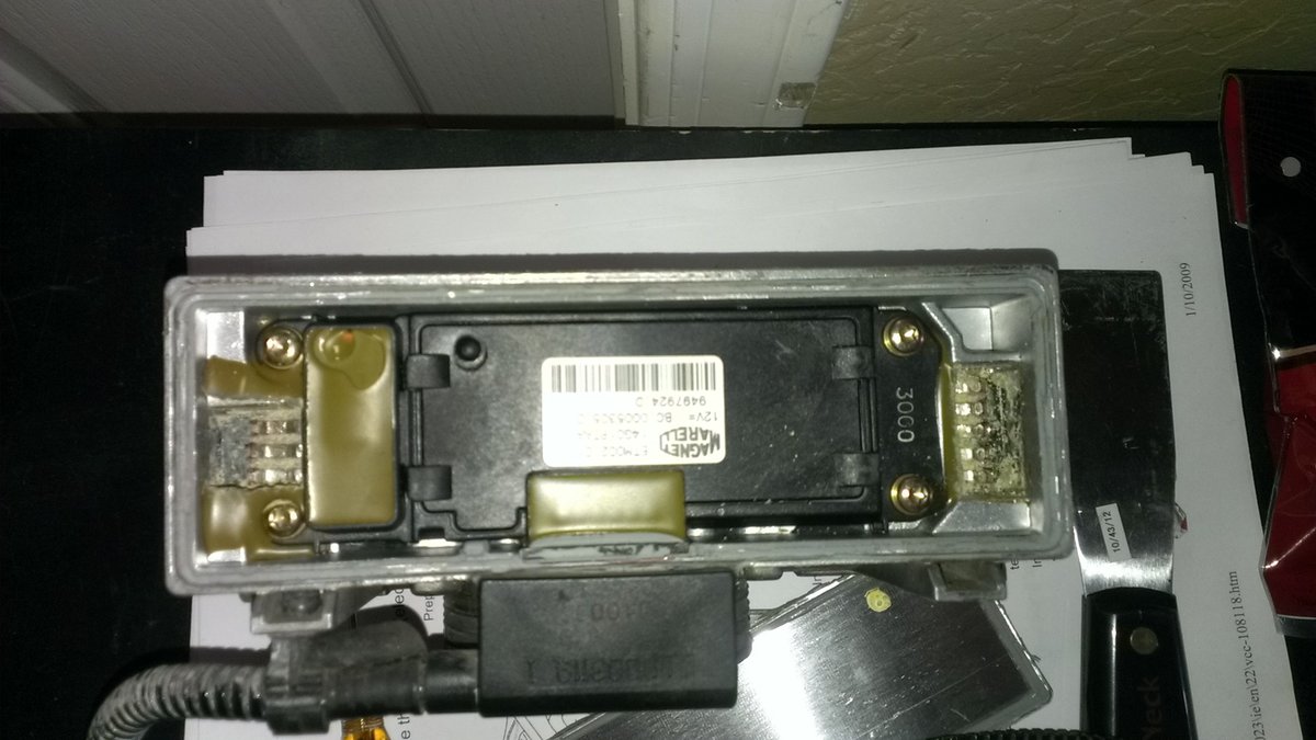 Removed epoxy. All contections still untouched. Senors still on the ETM.