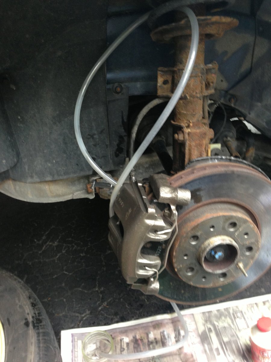 Bleeder on caliper was 10mm, original 11 mm - note loop in hose to keep bleeder wet - I ran about 250 mL of brake fluid through new caliper and found brakes were great after this. Pressure bleeding system after having it open is highly recommended.