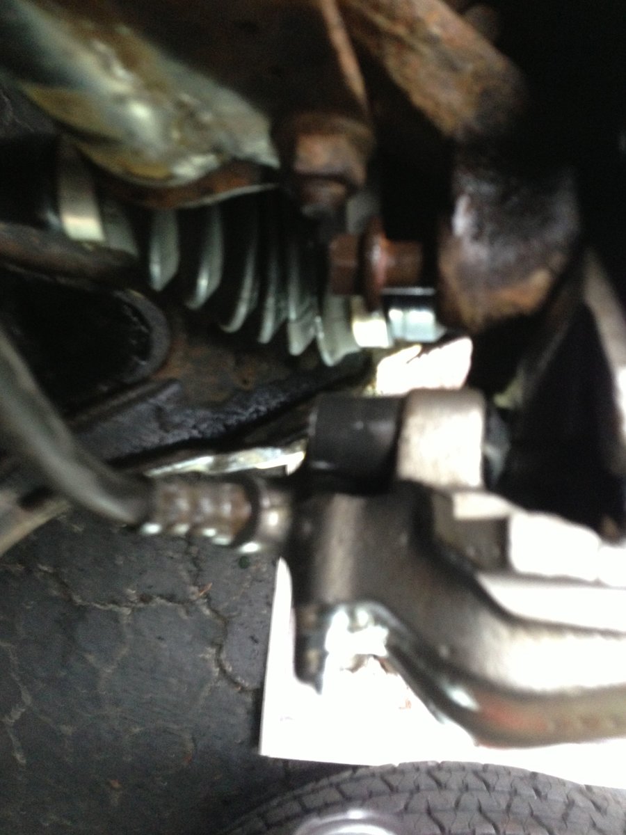 Start the Caliper mounting bolts carefully, by hand, use blue (medium strength) locking compound, and get them nice and firm