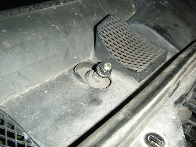 Wiper blade arms removed to allow removal of cowl, to allow removal of the four (4) carriage bolts, which are supposed to secure the dash through the firewall