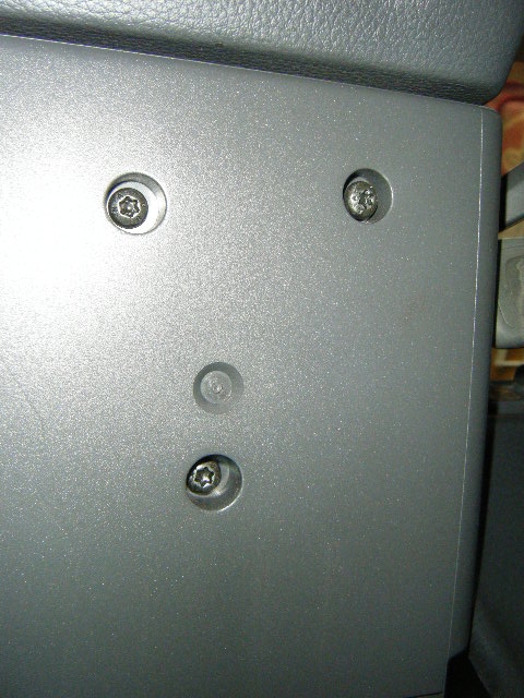 On to the rest of the dash...These three (3) screws are at the bottom of the plastic trim around the steering column and when removed, aid in removing the two pieces of plastic trim surrounding the steering column...