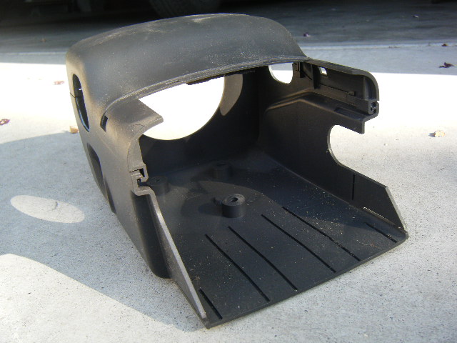 Steering column trim assembly, re-assembled once removed, "rear view"