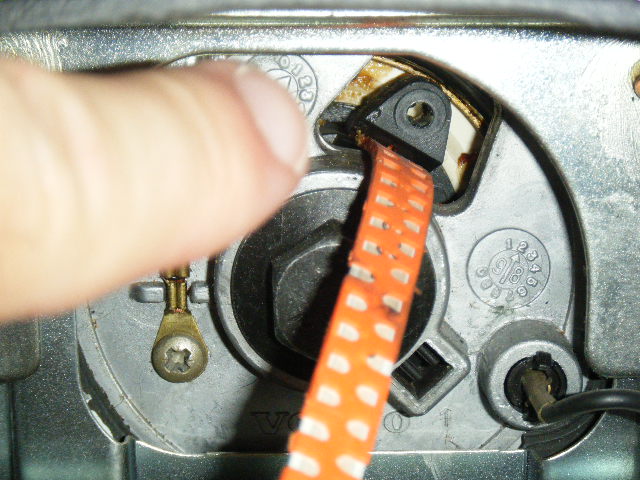 Additionally, prior to steering wheel removal, this hole I am pointing to must be secured by being "pinned" in place...it relates to a spring-loaded spool in the back that helps actuate the airbag...and if "unspooled", must be re-spooled somehow