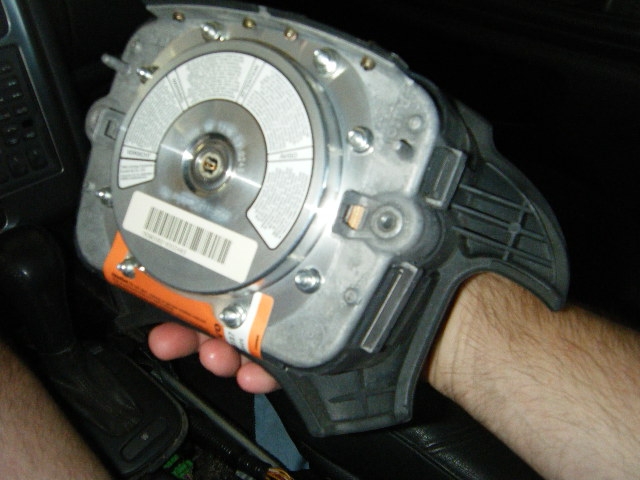 All alone in it's glory, the steering wheel airbag/horn assembly, from the rear