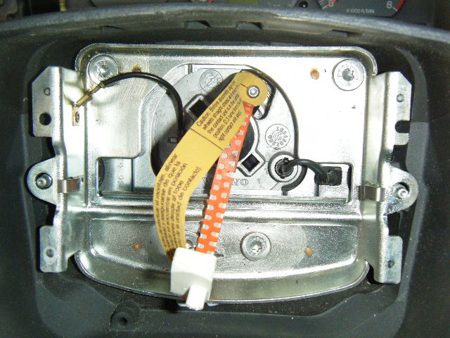 Screw in place to keep the spool from unwinding...