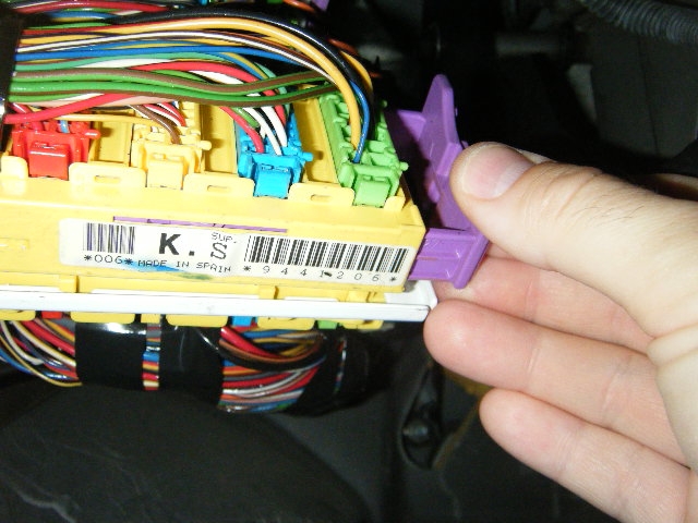 Pull the purple release tab...