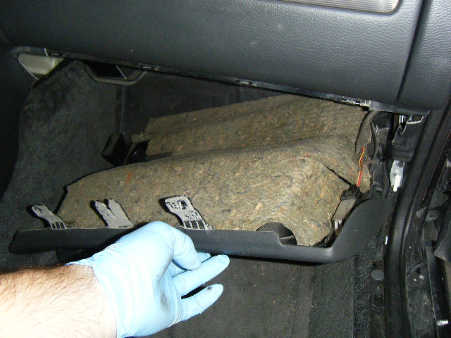 The lower dash panel (passenger side) being lowered and removed...