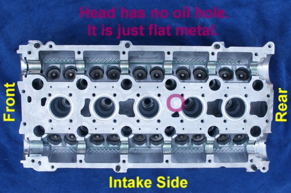 Spot where cam cover hole meets on turbo cars and newer Volvo heads.