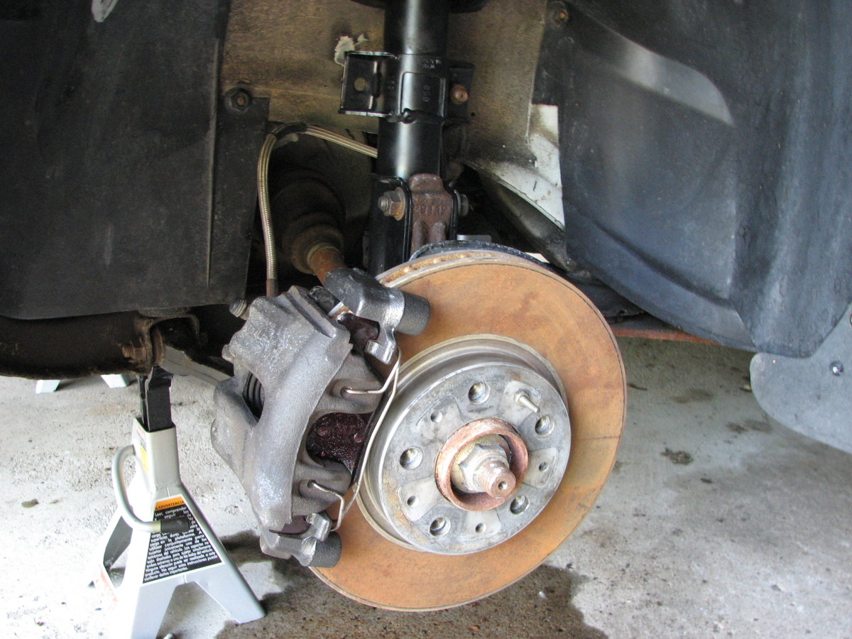 Salvage rotors oxidized, but fine. Braided lines already there. '96 Turbo Wagon.