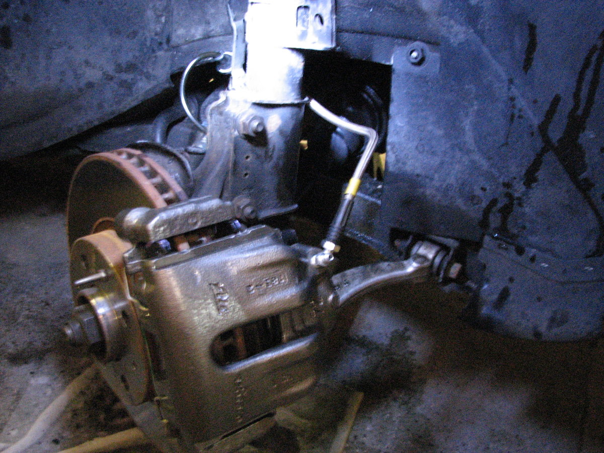 The '93 Sedan getting New calipers, the Akebono Ceramic and braided line treatment.